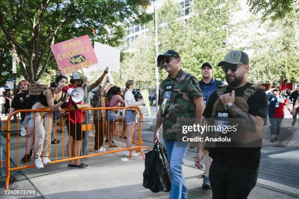Protesters yell at people leaving the NRA convention in Houston, Texas, United States on May 28 the days after a mass shooting at a Texas elementary...