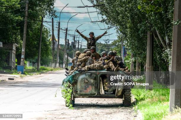 Soldiers on a tank in the streets of Lysychansk on the high right bank of the Donets River in the Luhansk region. The city is part of a metropolitan...