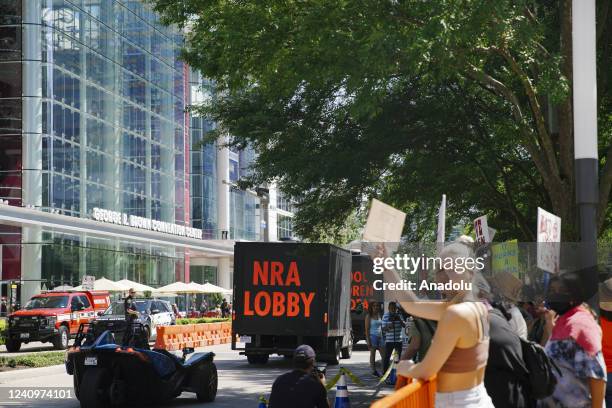 Protesters rally outside of the NRA convention in Houston, Texas, United States on May 28 the days after a mass shooting at a Texas elementary school...