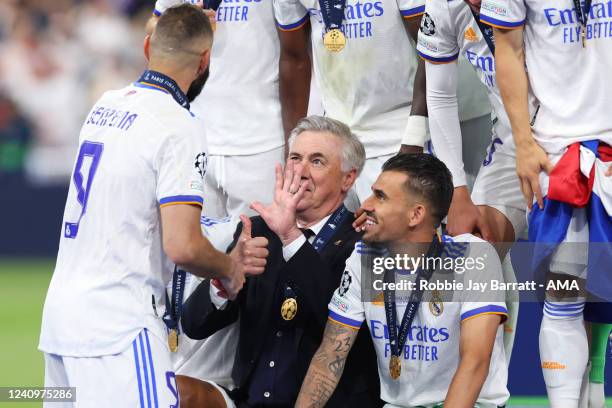 Carlo Ancelotti the manager / head coach of Real Madrid gestures the number six towards Karim Benzema of Real Madrid during the UEFA Champions League...