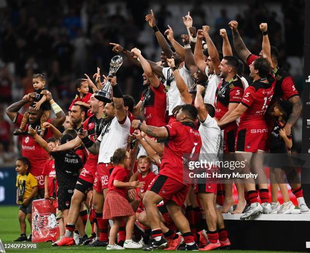 Marseille , France - 27 May 2022; Lyon captain Jordan Taufua lifts the trophy with teammates after his side's victory in the Heineken Challenge Cup...