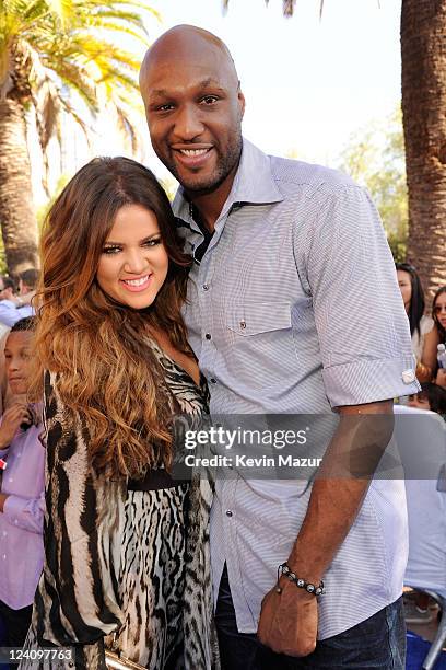 Personality Khloe Kardashian and professional basketball player Lamar Odom arrive at the 2011 Teen Choice Awards held at the Gibson Amphitheatre on...