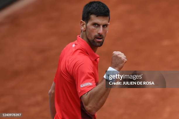 Serbia's Novak Djokovic reacts after winning against Diego Schwartzman during their men's singles match on day eight of the Roland-Garros Open tennis...