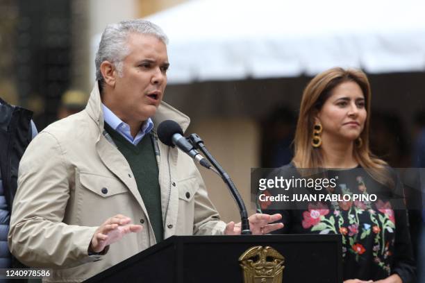 Colombian President Ivan Duque speaks after voting at the polling station located at the National Capitol in Bogota during the presidential election,...