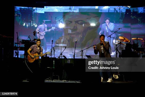Edgar Ramírez and Héctor Arizpe of Zeri performs as the open act for Jesús Adrián Romero at James L. Knight Center on May 28, 2022 in Miami, Florida.