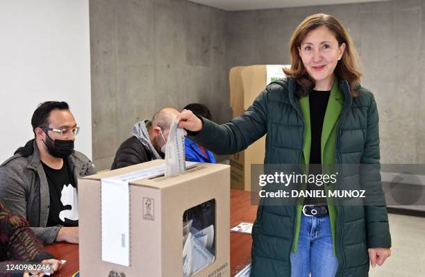 Former FARC hostage and ex-presidential candidate Ingrid Betancourt casts her vote at a polling station in Bogota on May 29 during the Colombian...