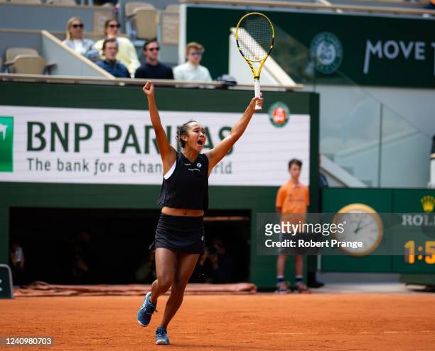 Leylah Fernandez of Canada reacts to converting match point against Amanda Anisimova of the United States her fourth round match on Day 8 at Roland...