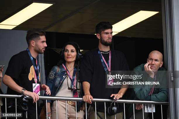 French football coach and former player Zinedine Zidane , his wife Veronique and his sons football players Theo an Luca watch from a balcony the...