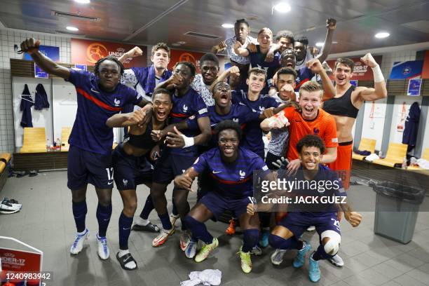 France's players celebrate winning the 2022 UEFA European Under-17 Championship semi-final football match between France and Portugal at the Netanya...