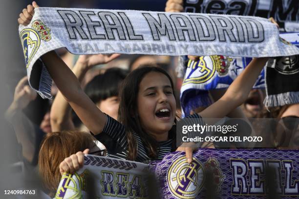 Real Madrid fans gather at the Puerta del Sol square to celebrate their team's 14th European Cup on May 29 in Madrid, a day after beating Liverpool...