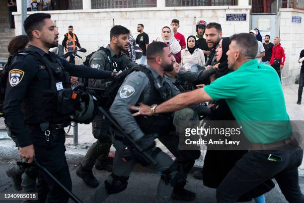 Israeli police officers clash with Palestinians during the annual Israeli flag march near Dung Gate on May 29, 2022 in Jerusalem, Israel. Jerusalem...