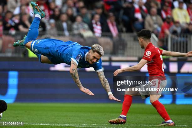 Dynamo Moscow's Uruguayan defender Guillermo Varela falls during the Russian Cup final football match between Spartak Moscow and Dynamo Moscow at the...