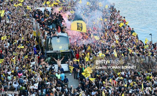 La Rochelle's players celebrate their European Rugby Champions Cup victory during a parade in La Rochelle, southwest France, May 29 a day after...