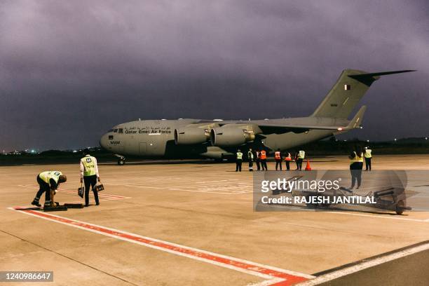 Qatar Emiri Air Force plane with humanitarian aid arrives at the King Shaka international airport on May 29, 2022 during the handing over of...