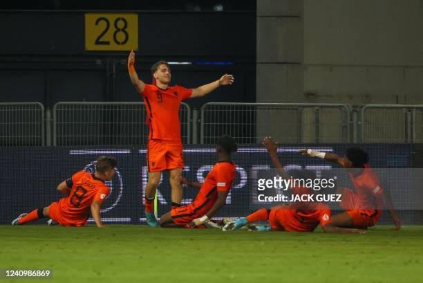 Netherland's forward Jason Van Duiven celebrates after scoring the opening goal during the 2022 UEFA European Under-17 Championship semi-final...