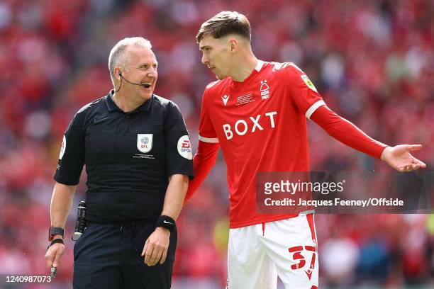 Jonathan Moss, the match referee interacts with James Garner of Nottingham Forest during the Sky Bet Championship Play-Off Final match between...