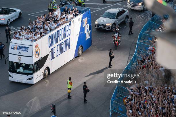 The Real Madrid team arrives by bus to the traditional celebration at Cibeles, where thousands of fans celebrate the 14th UEFA Champions League...
