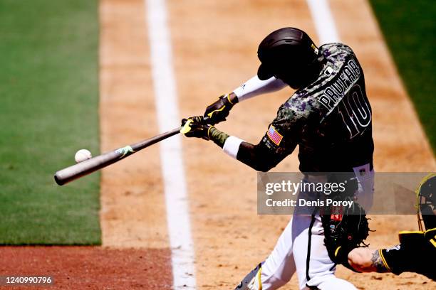 Jurickson Profar of the San Diego Padres hits a two-run home run during the fifth inning of a baseball game against the Pittsburgh Pirates on May 29,...