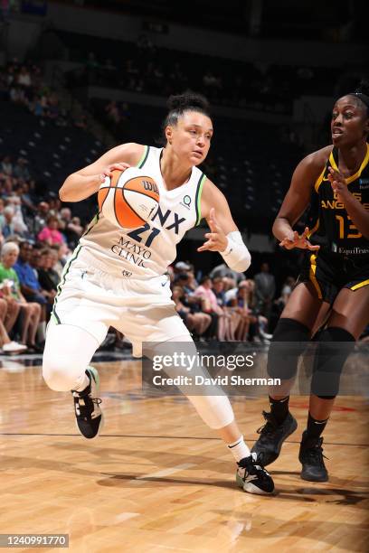 Kayla McBride of the Minnesota Lynx handles the ball during the game against the Los Angeles Sparks on May 29, 2022 at Target Center in Minneapolis,...