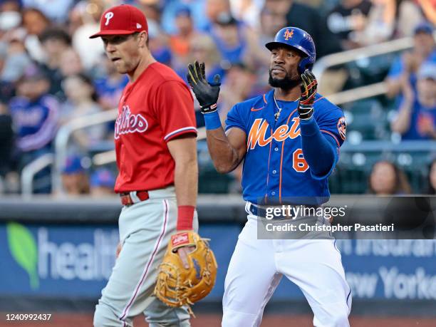 Starling Marte of the New York Mets reacts after reaching first base on a single in the bottom of the first inning against the Philadelphia Phillies...