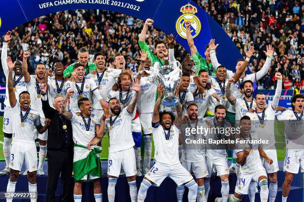 Of Real Madrid lifts the trophy as they celebrate winning the UEFA Champions League Final on the podium after the Final UEFA Champions League match...