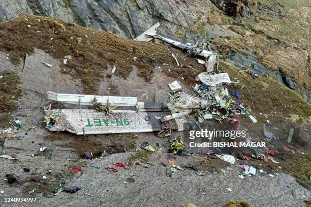 Graphic content / The wreckage of a Twin Otter aircraft, operated by Nepali carrier Tara Air, lay on a mountainside in Mustang on May 30 a day after...