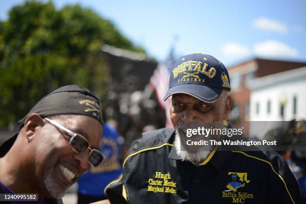 Hugh Valentine right, laughs while greeted by members of the Buffalo Soldiers motorcycle club at the African American Civil War Memorial in...