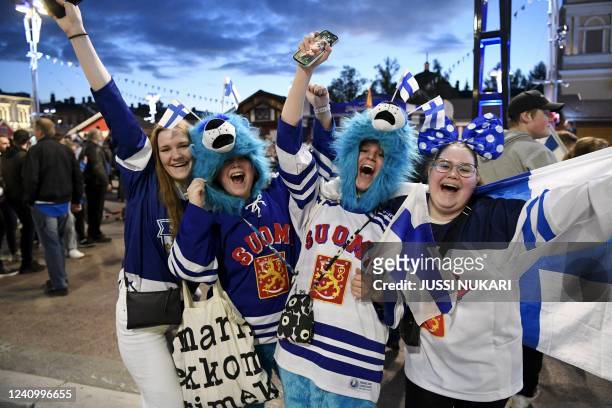 Finland ice hockey fans celebrate after their team won the final of the IIHF Ice Hockey World Championships final match between Finland and Canada in...