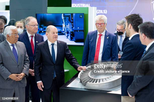 May 2022, Lower Saxony, Hanover: Antonio Costa , Prime Minister of Portugal, Stephan Weil , Minister President of Lower Saxony, and German Chancellor...