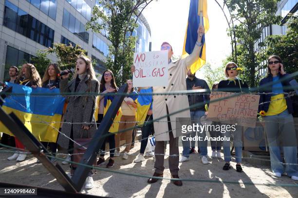 Ukrainians stage a demonstration ahead of EU Leaders' Summit demanding the oil import from Russia to hold in Brussels, Belgium on May 30, 2022.