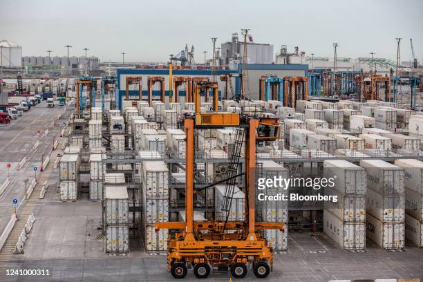 Cranes and shipping containers at the Muelle Sur terminal, operated by APM Terminals, at the Port of Barcelona in Barcelona, Spain, on Friday, May...