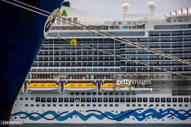 Lifeboats on the exterior of a cruise ship, docked beyond the Muelle Sur terminal, operated by APM Terminals, at the Port of Barcelona in Barcelona,...