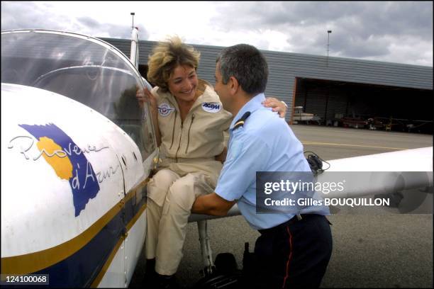 Dorine Bourneton paraplegic after crash and now a pilot for fire In France On July 27, 2002 - Here on board a specially equipped Rallye aircraft with...