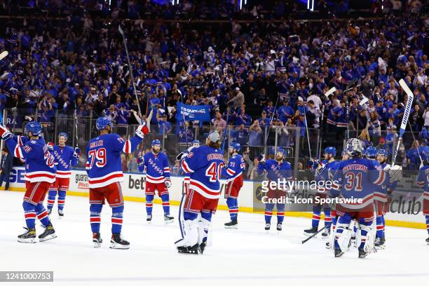 New York Rangers salute the fans after defeating the Carolina Hurricanes in Game 6 of round 2 of the Stanley Cup playoffs on May 28, 2022 at Madison...