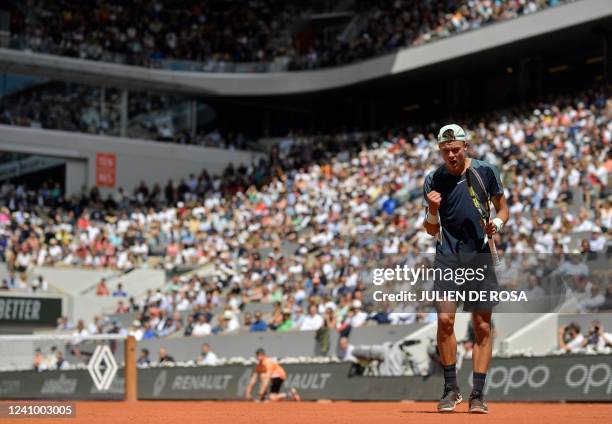 Denmark's Holger Rune reacts as he plays against Greece's Stefanos Tsitsipas during their men's singles match on day nine of the Roland-Garros Open...