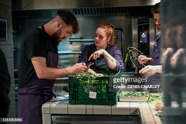 French chef Florent Ladeyn , recently awarded with a star at the Michelin guide, works in his restaurent in Lille, northern France, on May 25, 2022.