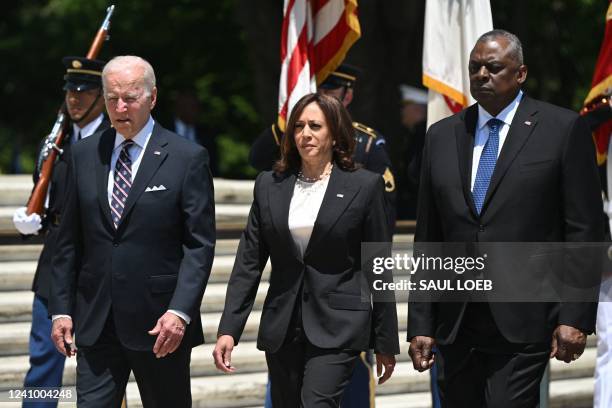 President Joe Biden, US Vice President Kamala Harris, and US Defense Secretary Lloyd Austin arrive to participate in a wreath laying ceremony at the...