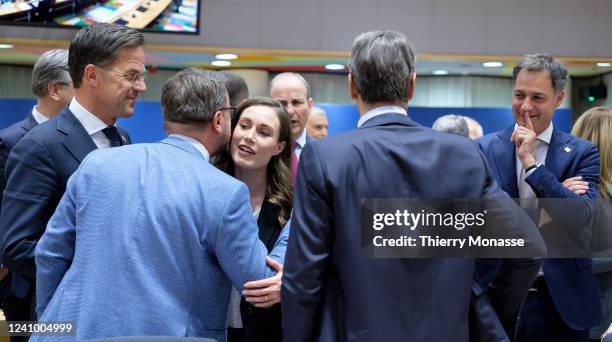 Dutch Prime Minister Mark Rutte is talking with the Luxembourg Prime Minister Xavier Bettel, the Finish Prime Minister Sanna Mirella Marin, the Irish...
