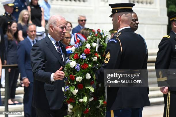 President Joe Biden participates in a wreath laying ceremony at the Tomb of the Unknown Soldier in honor of Memorial Day at Arlington National...