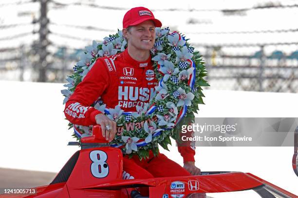 Marcus Ericsson poses for a photo in his car on May 30 after winning the106th running of the Indianapolis 500 at the Indianapolis Motor Speedway.
