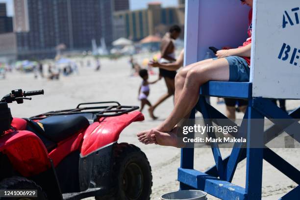 Lifeguard Phone Smartphone At Beach Photos and Premium High Res Pictures - Getty Images