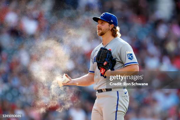 Jonathan Heasley of the Kansas City Royals uses the rosin bag in the fourth inning against the Cleveland Guardians at Progressive Field on May 30,...