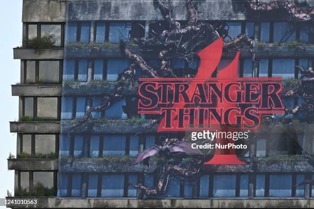 Partial view of the banner advertising the premiere of the fourth season of the Netflix series 'Stranger Things' seen on the facade of the former...