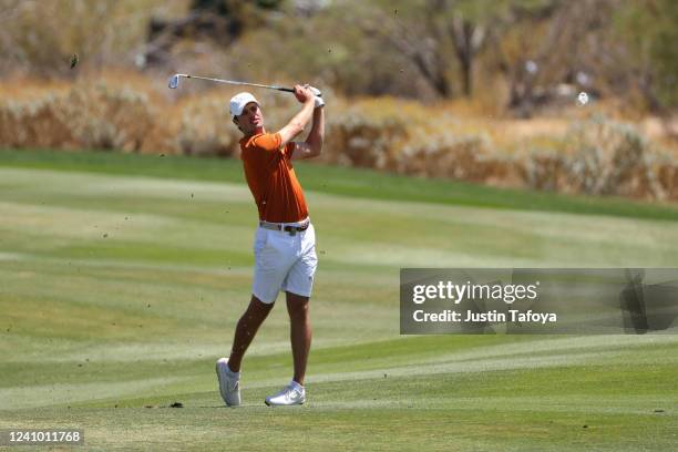 Cole Hammer of the Texas Longhorns hits his approach shot during the Division I Mens Golf Championship held at the Grayhawk Golf Club on May 30, 2022...