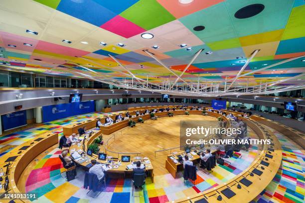 Senegal's President and Chairperson of the African Union Macky Sall talks during a video conference with leaders of the European Union on the second...