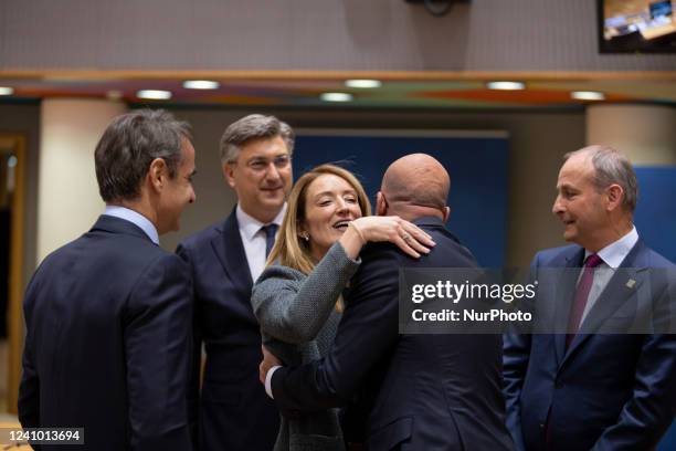 Roberta Metsola President of the European Parliament at the European Council meeting as seen hugging and talking to Charles Michel President of the...