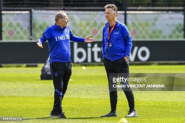 Dutch national football team's Assistant national coach Danny Blind, and head coach Louis van Gaal lead a training session ahead of the UEFA Nations...