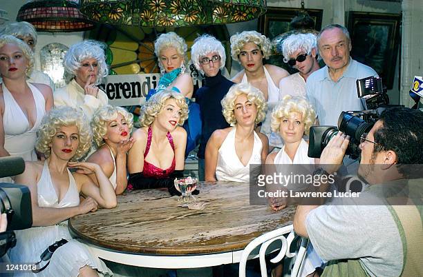 Marilyn Monroe and Andy Warhol fans appear at a look-alike contest and seance at the restaurant Serendipity August 2, 2002 in New York City. August 5...