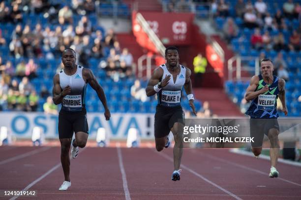 South Africa's Akani Simbine , Jamaica's Yohan Blake and Czech Republic's Jan Veleba compete during the men's 100m event at the IAAF 2022 Golden...