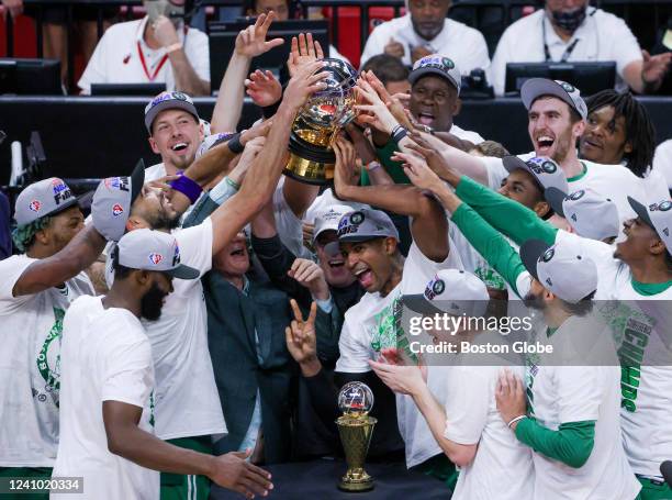 Boston Celtics hoist the championship trophy after they defeated the Miami Heat 100-96. The Boston Celtics visit the Miami Heat for game 7 of the NBA...